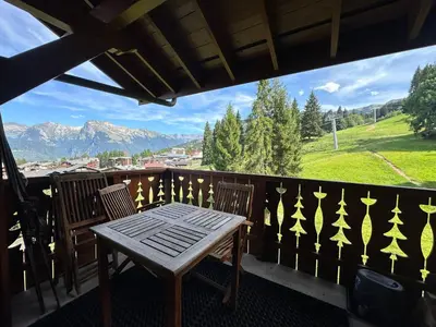 an overhead view of a green field with trees at Appartement confortable au pied des pistes pour 8 personnes - FR-1-642-104 in Morillon
