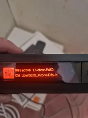 a close up of a digital clock on a tv at Appartement Lyret, Chamonix Centre, 4 personnes in Chamonix-Mont-Blanc