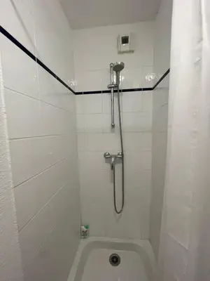a bathroom with a shower and a bath tub at Les 3 balcons du Mont Joly in Les Contamines-Montjoie