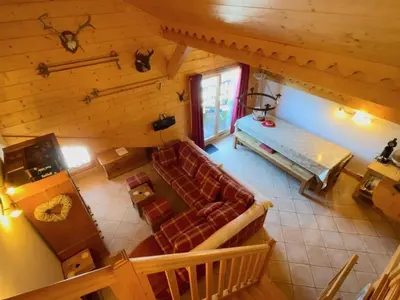 an overhead view of a living room with a couch at Appartement spacieux 70m², balcon, parking privatif, 6 personnes - FR-1-572-333 in Arâches-la-Frasse