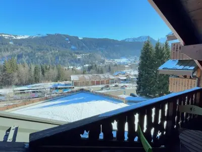 a view of a pool from a balcony at Appartement spacieux 70m², balcon, parking privatif, 6 personnes - FR-1-572-333 in Arâches-la-Frasse