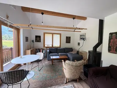 a living room with a couch and a table at Apartment in Chamonix in Chamonix-Mont-Blanc