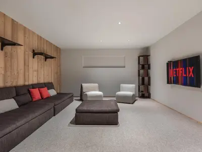 a living room with a couch and a chair at Chalet calme à Megève - 4 chambres, proche centre, parking inclus - FR-1-569-201 in Megève