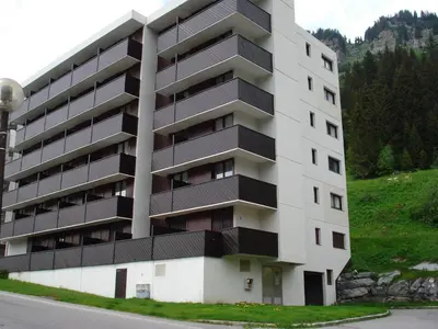 a view of a mountain with cars parked in a parking lot at Appartement rénové 3 pièces · Balcon sud · WIFI gratuit · Flaine Forêt - FR-1-425-236 in Arâches-la-Frasse
