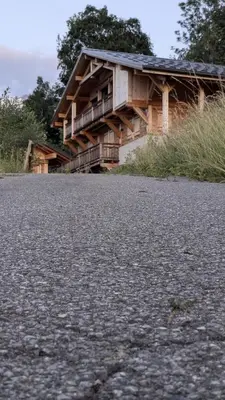 a house sitting on the side of a road at Le Chalet MontBlanc in Bionnay