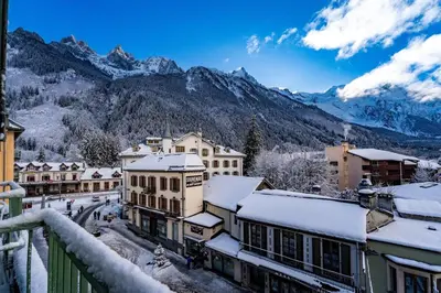 a view from the roof of a building in the snow at Hyper central apartment with rooftop in Chamonix-Mont-Blanc