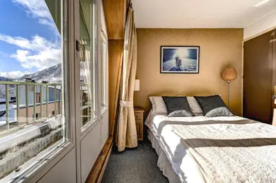 a bathroom with two sinks and a washing machine at Hyper central apartment with rooftop in Chamonix-Mont-Blanc