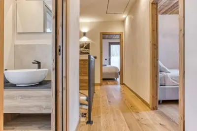 a bathroom with a tub and a sink in a room at Luxurious Chalet Verney - 8 people in Chamonix-Mont-Blanc