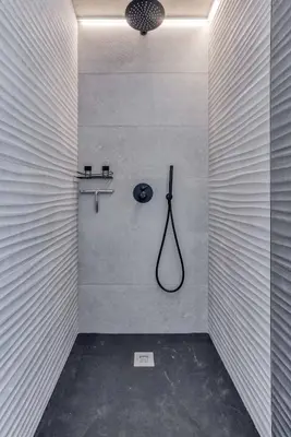 a bathroom with a shower with a hose at Luxurious Chalet Verney - 8 people in Chamonix-Mont-Blanc