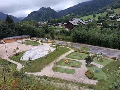 an aerial view of a park with a playground at Les Contamines Montjoie in Le Cugnon