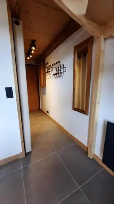 an empty room with a white wall and a door at NEW - Le Splendid' - Duplex standing rénové 6-8 pers in Arâches-la-Frasse