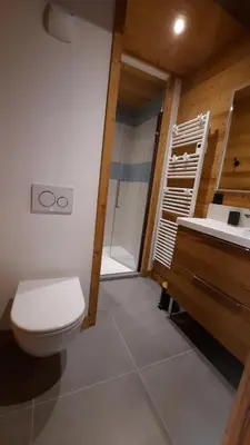 a bathroom with a toilet and a sink at NEW - Le Splendid' - Duplex standing rénové 6-8 pers in Arâches-la-Frasse