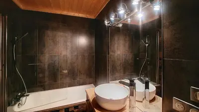 a bathroom with a toilet and a shower and a sink at 1 Chalet de Rochebrune B in Megève