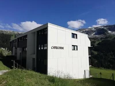 a white building with the word chamonix on it at Résidence Capricorne - maeva Home - Studio 4 Personnes - Budget MAE-3836 in Flaine