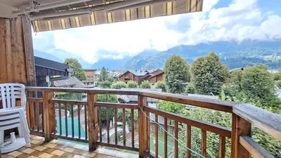 a balcony with a view of the mountains at Appartement Samoens village in Samoëns