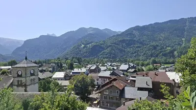 an overview of a town with mountains in the background at Appartement Samoens village in Samoëns