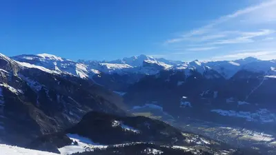 a view of a mountain range with snow covered mountains at Appartement Samoens village in Samoëns