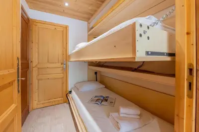 a bathroom with a toilet and a sink and a tub at Clos Du Savoy - South Facing Balcony - Happy Rentals in Chamonix-Mont-Blanc