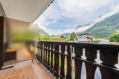 a small room with a bunk bed and a closet at Clos Du Savoy - South Facing Balcony - Happy Rentals in Chamonix-Mont-Blanc