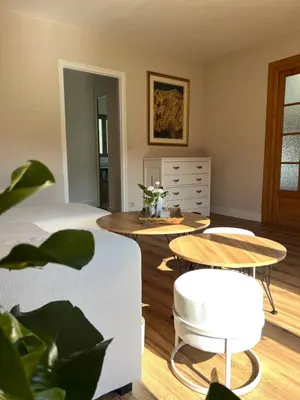 a bedroom with a bed and a table and chairs at Appartement Champêtre - Terrasse, Vue & Parking by AlpenlySallanches in Domancy