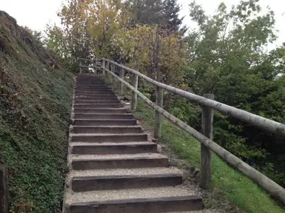 a set of stone stairs leading up a hill at 3 Pièces aux Carroz, 6 Pers, Terrasse, Parking - FR-1-572-338 in Arâches-la-Frasse