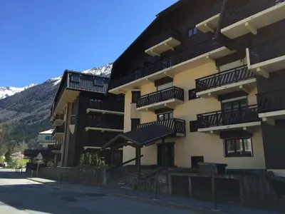 a large building with balconies on the side of it at Les Sommets Studio in Chamonix-Mont-Blanc