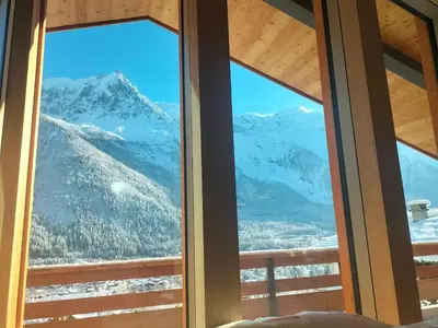 a view from the window of a mountain at Chalet Acorn in Chamonix-Mont-Blanc