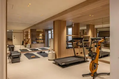 a fitness room with a gym with exercise equipment at Chalet Acorn in Chamonix-Mont-Blanc