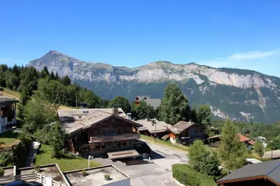 an aerial view of a resort with mountains in the background at BA332 Appartement 4 6 Pers Pied de pistes Carroz in Les Carroz d'Araches