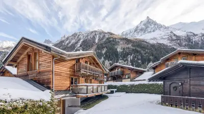 an overhead view of a log house with a deck at Chalet Deutz in Chamonix-Mont-Blanc