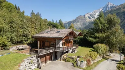 a log cabin in the mountains in the snow at Chalet Mowgli in Chamonix-Mont-Blanc