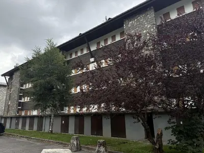 a building with vines growing on the side of it at Appartement aux Carroz d'Arâches, 4 pers, 39 m² - FR-1-572-327 in Arâches-la-Frasse