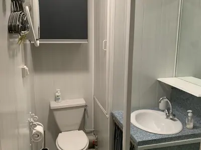 a small bathroom with a toilet and a sink at Studio confortable à Samoëns 1600 pour 4 personnes - FR-1-846-3 in Samoëns