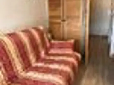 a living room with a couch and two chairs at Studio cosy à Samoëns pour 4 personnes - FR-1-846-21 in Samoëns