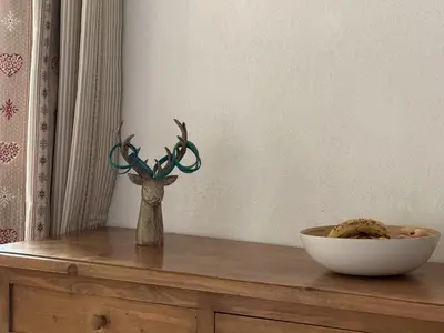 a vase on a table with a bowl on a table at Appartement cosy 1 chambre - Samoëns - Wifi - FR-1-846-25 in Samoëns