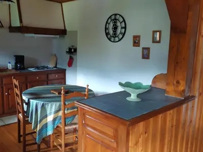 a kitchen with a table with a bowl on top of it at Maison conviviale à Samoëns - 2 chambres, Wi-Fi, pour 6 personnes - FR-1-846-29 in Samoëns