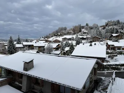 a town covered in snow with houses at Appartement de standing 3 chambres au centre, pied de piste, parking et WIFI - FR-1-836-5 in Arâches-la-Frasse