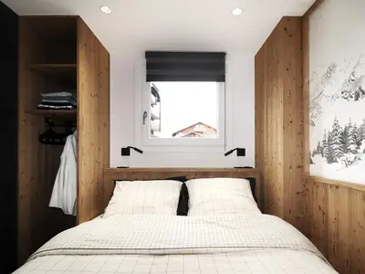 a bedroom with a bed and a window at Appartement central 1 chambre, 4 pers, WIFI, garage - FR-1-836-12 in Arâches-la-Frasse