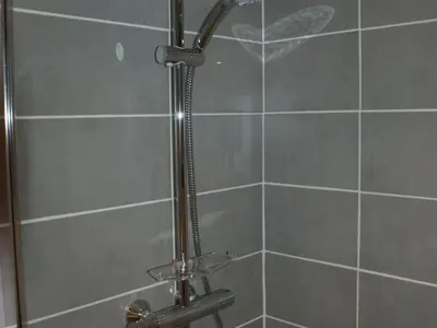 a shower in a bathroom with a glass door at Appartement rénové 50 m², 2 chambres, centre, WIFI - FR-1-836-6 in Arâches-la-Frasse