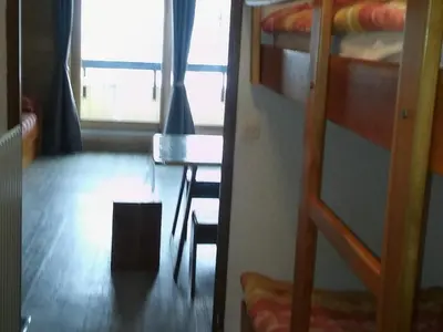 a room with a desk and bunk beds at Studio 26 m² - 4 pers - Les Carroz d'Arâches - FR-1-836-10 in Arâches-la-Frasse