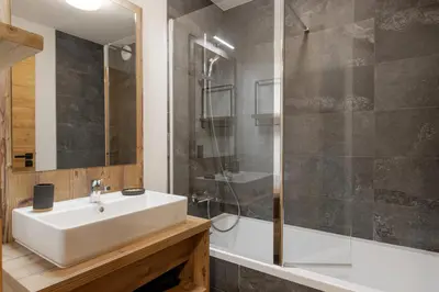 a bathroom with a sink and a shower at Alpine Bliss - Sources, Ski in Saint-Gervais-les-Bains