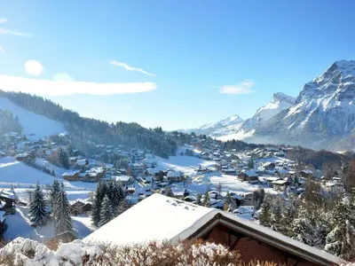 a small town in the snow with a mountain at Appartement à Arâches-la-Frasse pour 4 personnes - FR-1-572-334 in Arâches-la-Frasse