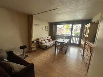 a living room with a couch and a table at Appartement à Arâches-la-Frasse pour 4 personnes - FR-1-572-334 in Arâches-la-Frasse