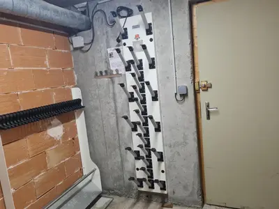 a room with a door and a brick wall at Studio rénové pour 4 au pied de la piste de luge - FR-1-836-13 in Arâches-la-Frasse