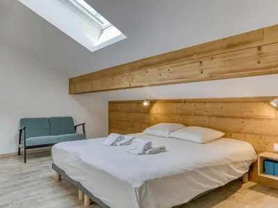 a dining room with a table and chairs at Duplex 4 pièces, 3 chambres, 6 personnes, proche centre, parking, wifi - FR-1-663-52 in Saint-Gervais-les-Bains