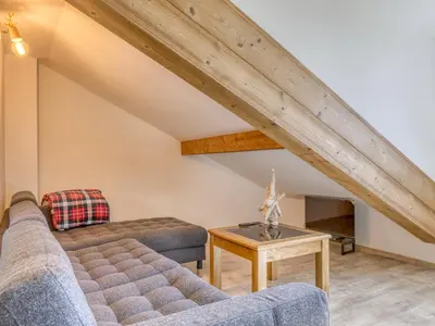 a kitchen with wooden cabinets and a stainless steel appliance at Duplex 4 pièces, 3 chambres, 6 personnes, proche centre, parking, wifi - FR-1-663-52 in Saint-Gervais-les-Bains