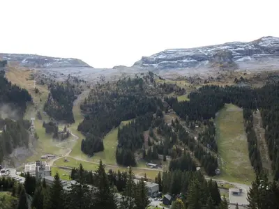 a view from the top of a mountain with trees at Studio cosy 4 pers, 300m des pistes, Flaine - FR-1-687-97 in Arâches-la-Frasse