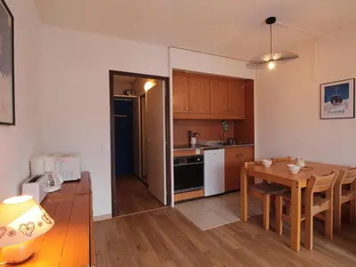 a kitchen and dining room with a table and a dining room at Studio cosy 4 pers, 300m des pistes, Flaine - FR-1-687-97 in Arâches-la-Frasse