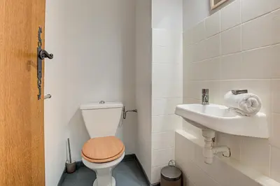a bathroom with a toilet and a sink at Apartment Mika , Alpes Travel, Slope side location, Central Chamonix, Sleeps 4 6 in Chamonix-Mont-Blanc