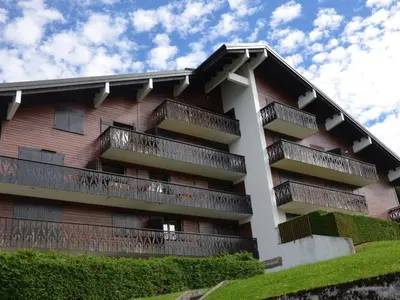 a building with balconies on the side of it at Charmant 2 pièces avec WIFI et 4 couchages à Le Pernant - FR-1-836-16 in Arâches-la-Frasse